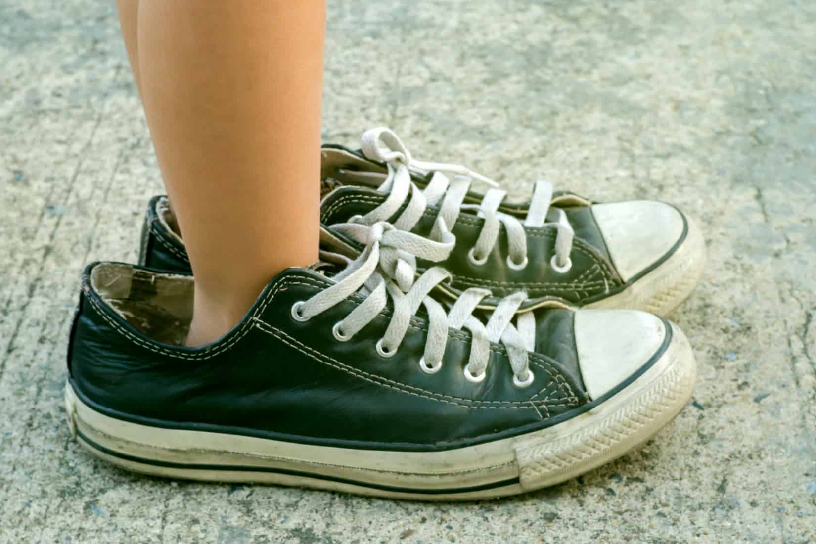 kid-wearing-adult-shoes